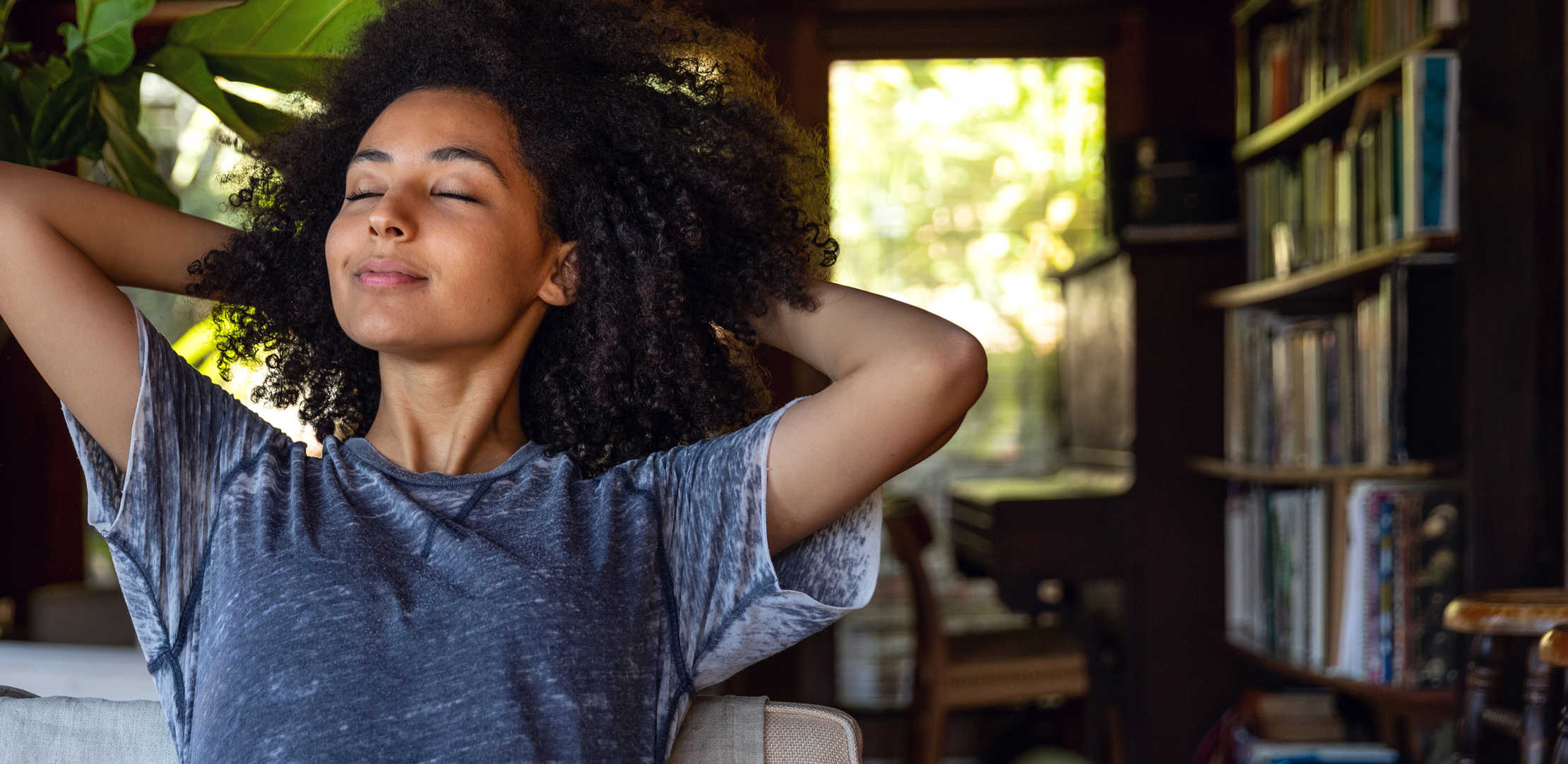 A woman breath in a living room